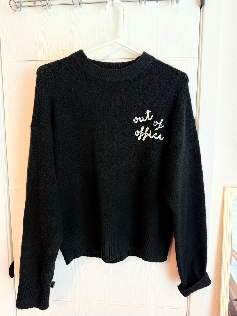 a new day Black Crewneck Sweater with White "Out of Office" Embroidery